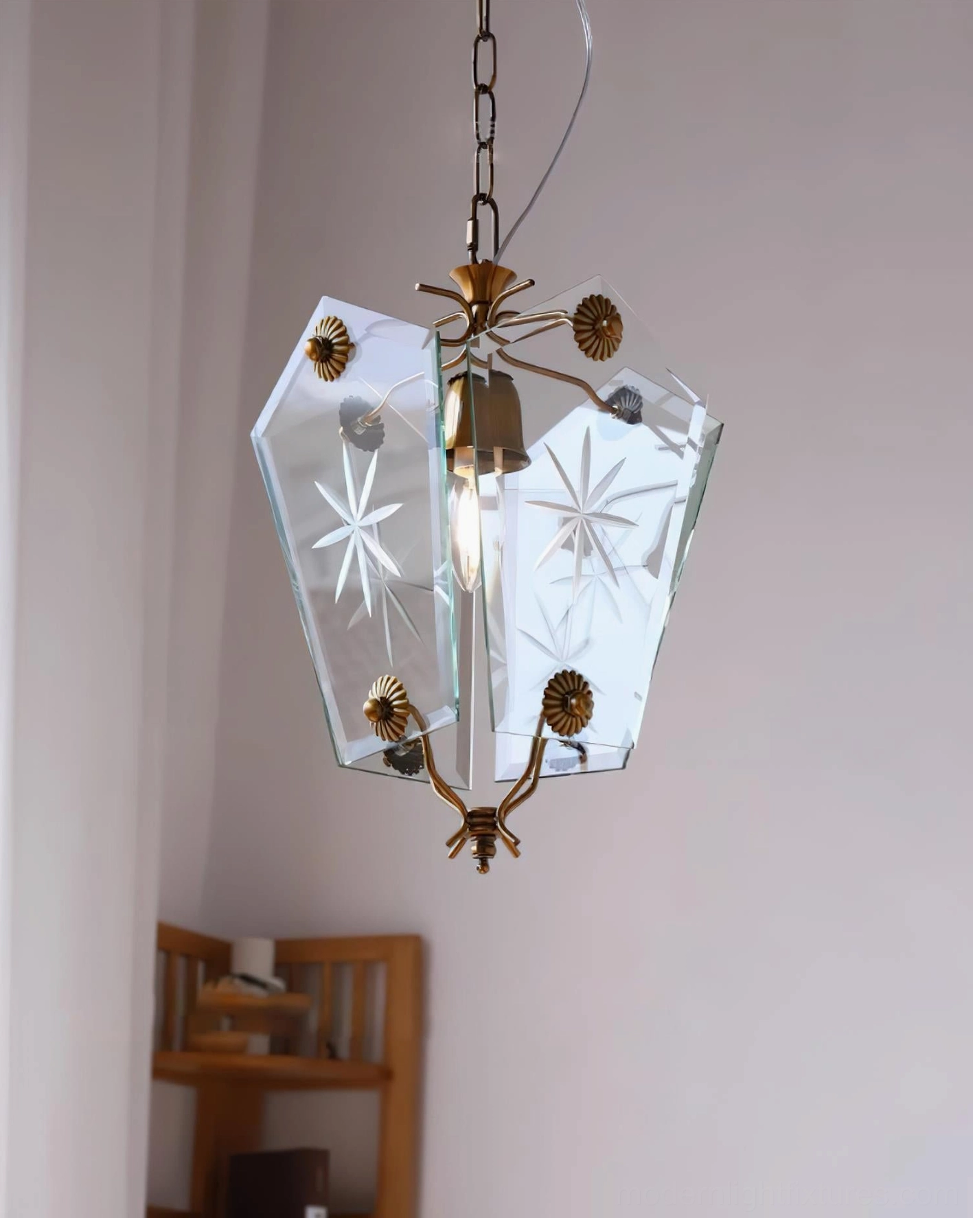 Illuminated vintage glass pendant lamp brass metal work shelf interior design setting