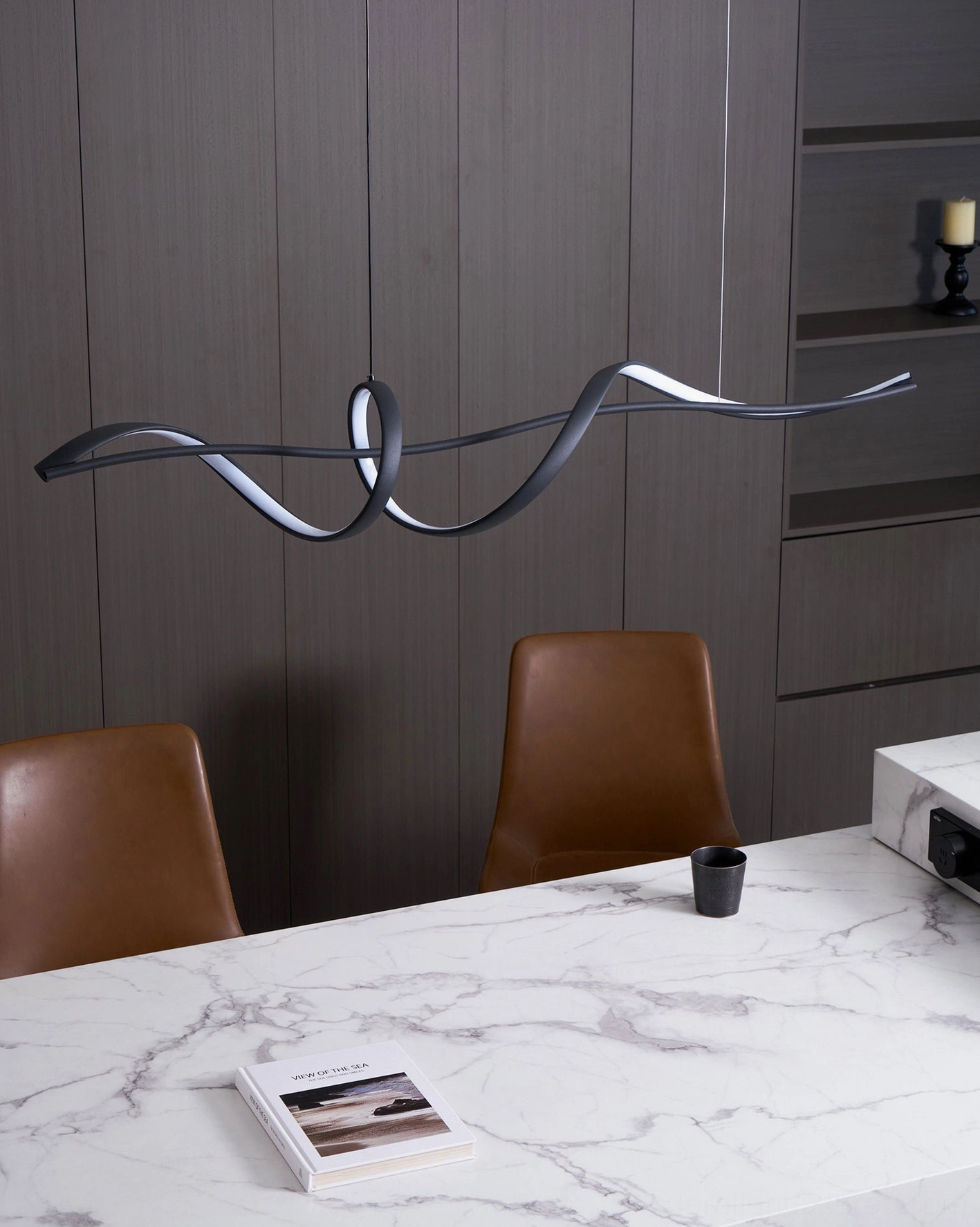 Inari wavy linear chandelier side detail view marble table luxury minimalist dining