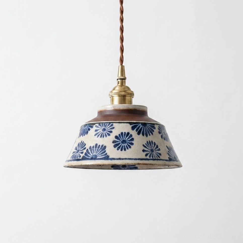 Indigo dot patterned hand-glazed ceramic pendant lamp close-up showing artisan glaze work and brown rim finish