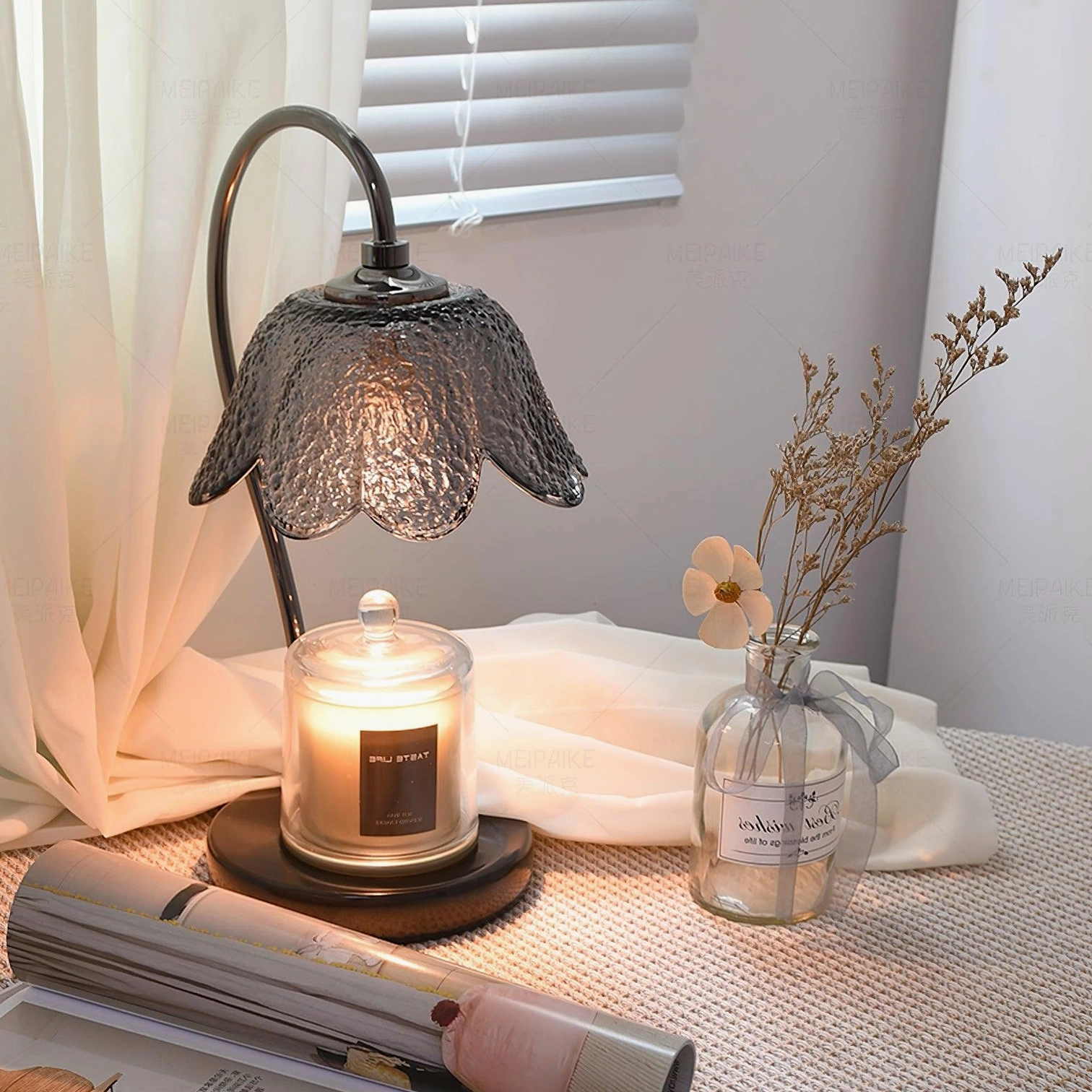 Contemporary black marble candle warmer lamp with industrial aesthetic metal components