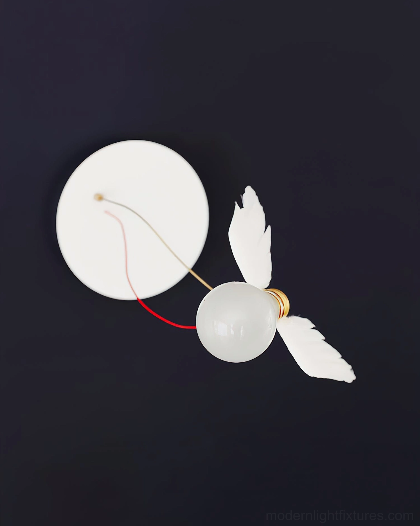 Industrial modern feathered wall sconce with exposed wiring in loft apartment interior