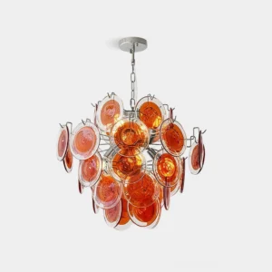 Iridescent glass disc chandelier with amber art glass and chrome frame in studio setting