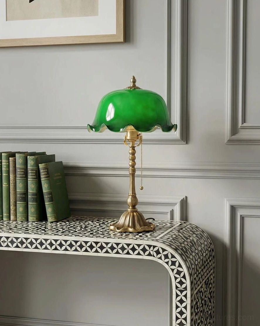 Jadelle vintage banker lamp with warm white LED bulb glowing through jade-green glass