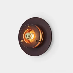 Jaima round wall sconce close-up front view showing layered circular disc design with dark walnut wood and brass metal details