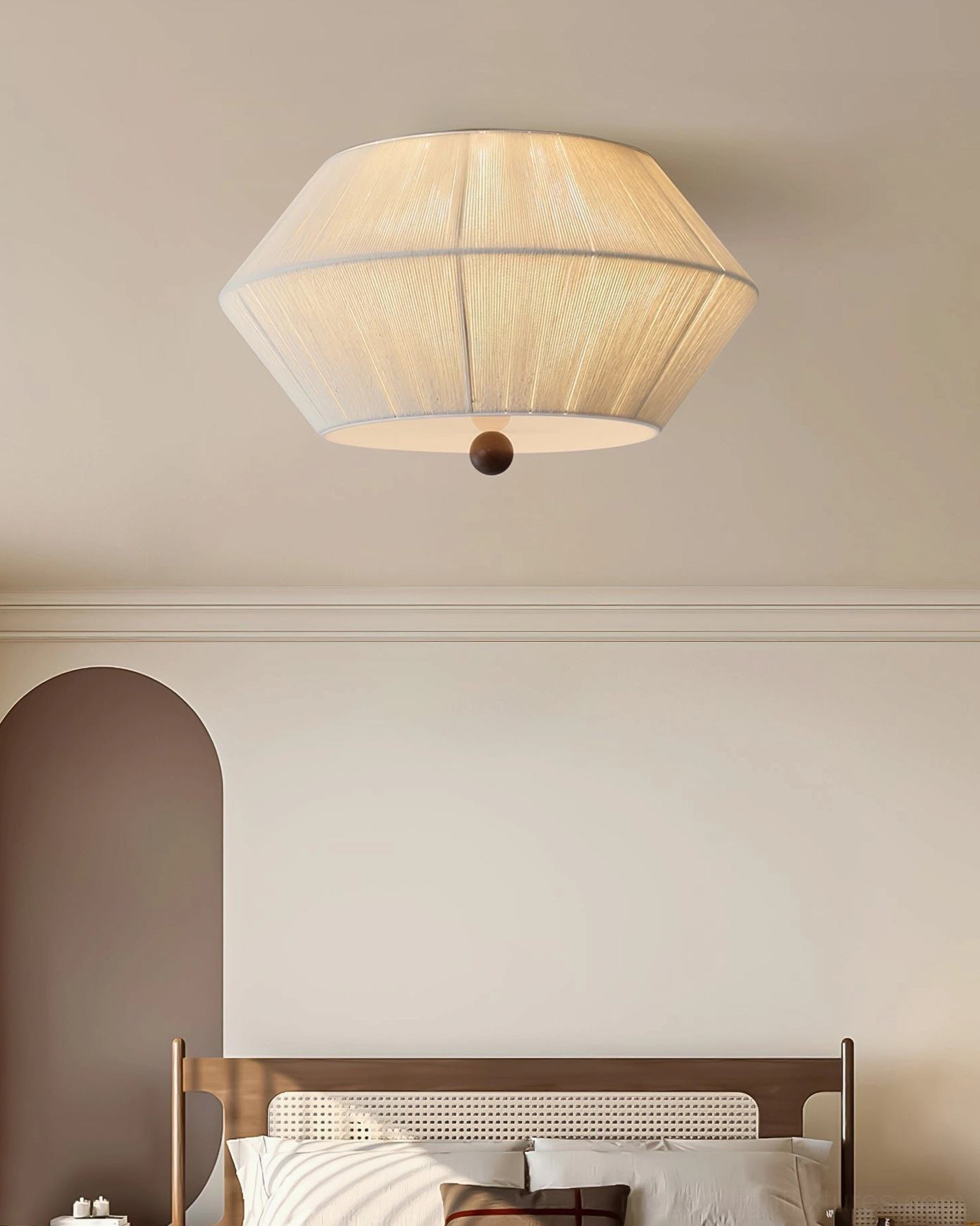 Tapered fabric ceiling light in Japandi minimalist bedroom creating serene restful atmosphere