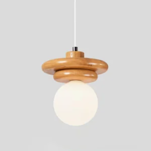 Minimalist pendant light featuring concentric wooden discs and frosted glass diffuser, Japandi design aesthetic