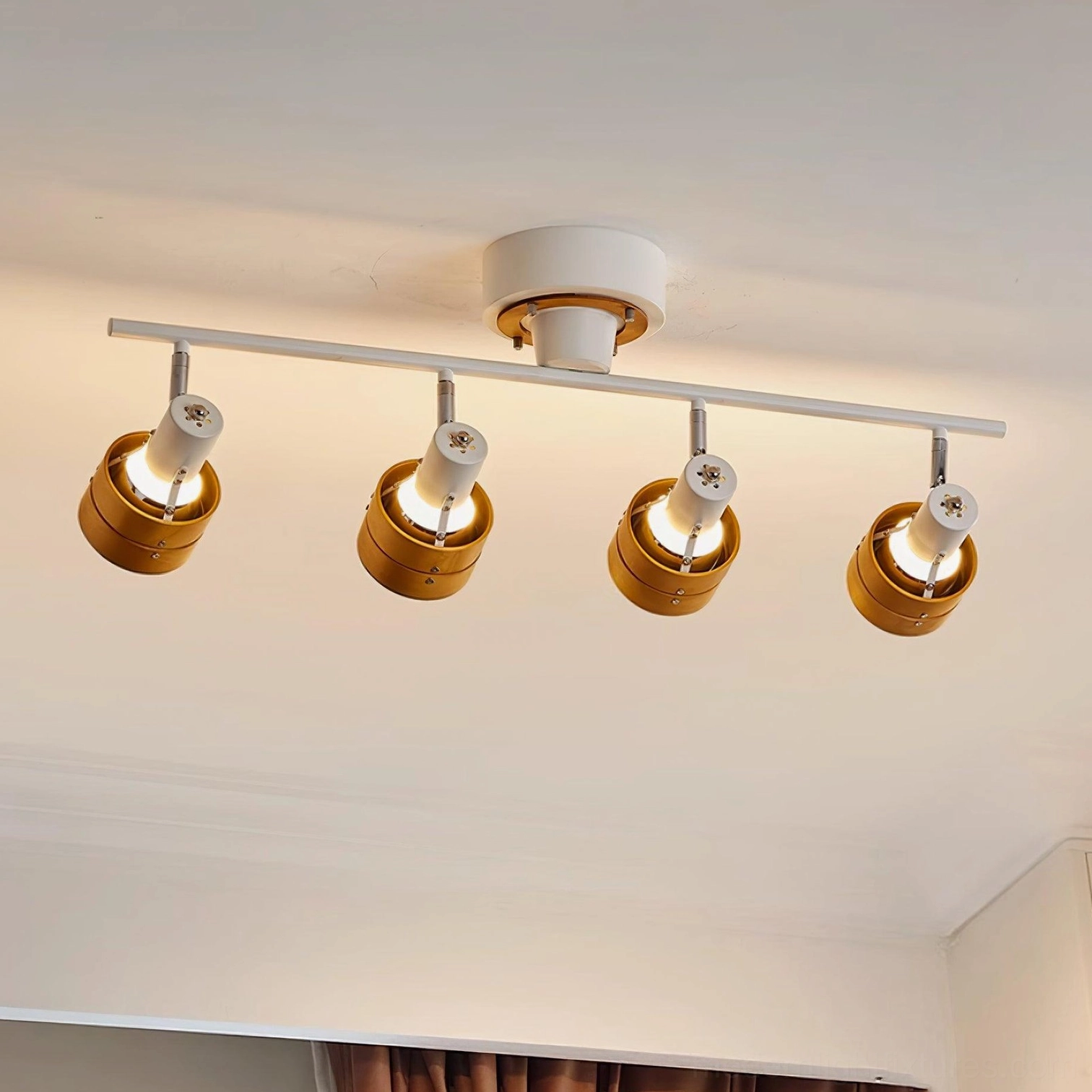 Japandi minimalist track lighting fixture transforming room ambiance with layered illumination