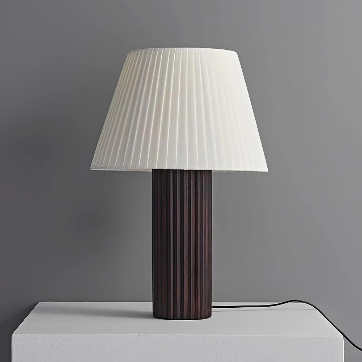 Premium natural wood table lamp with ribbed texture base and pleated shade in japandi wabi-sabi minimalist interior design aesthetic