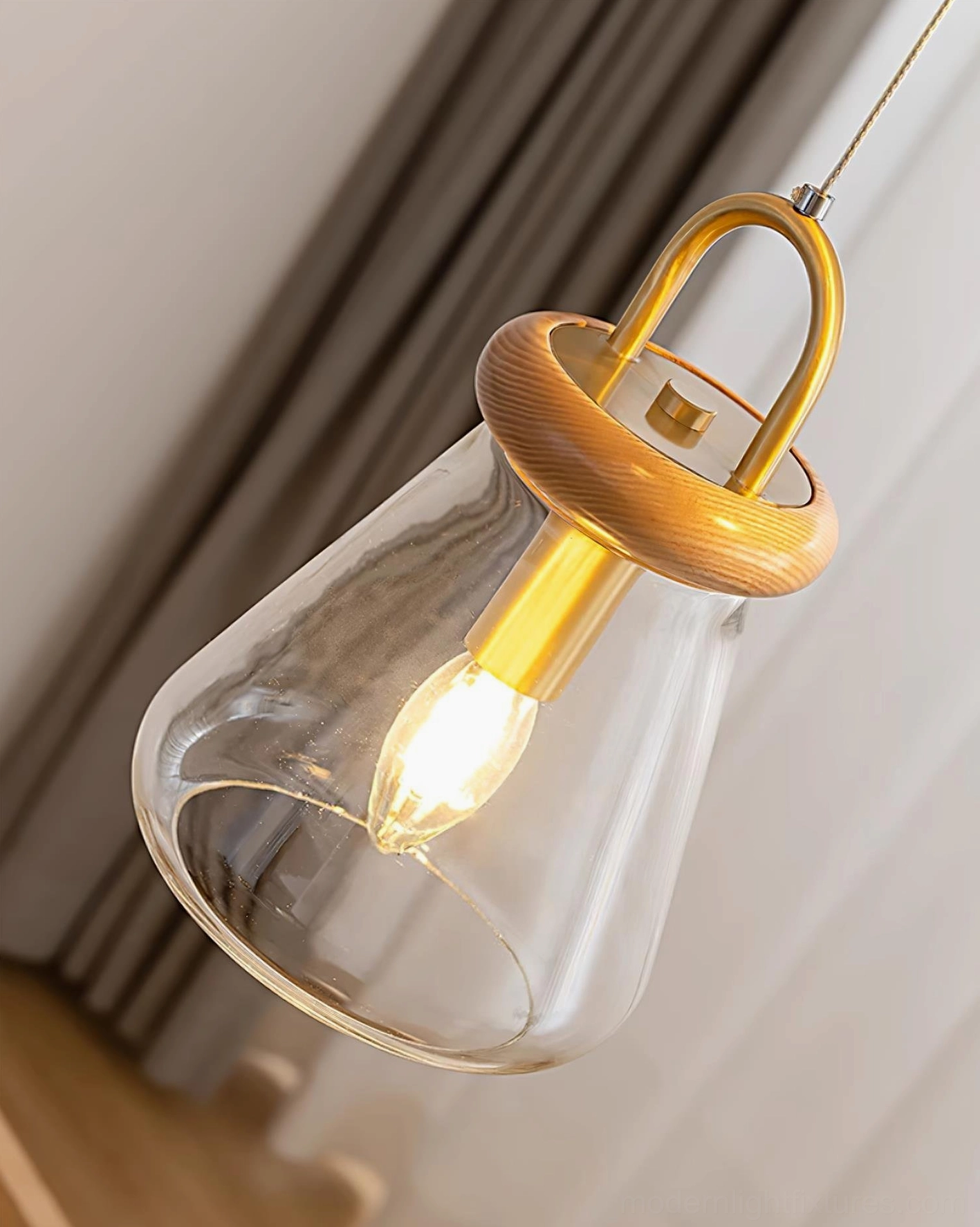 Multiple jar pendants creating gallery-style lighting arrangement in modern home interior