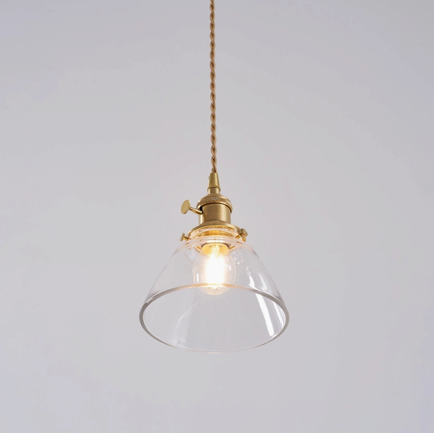Jasmine fluted glass pendant creating dynamic light texture on wall surface evening ambiance