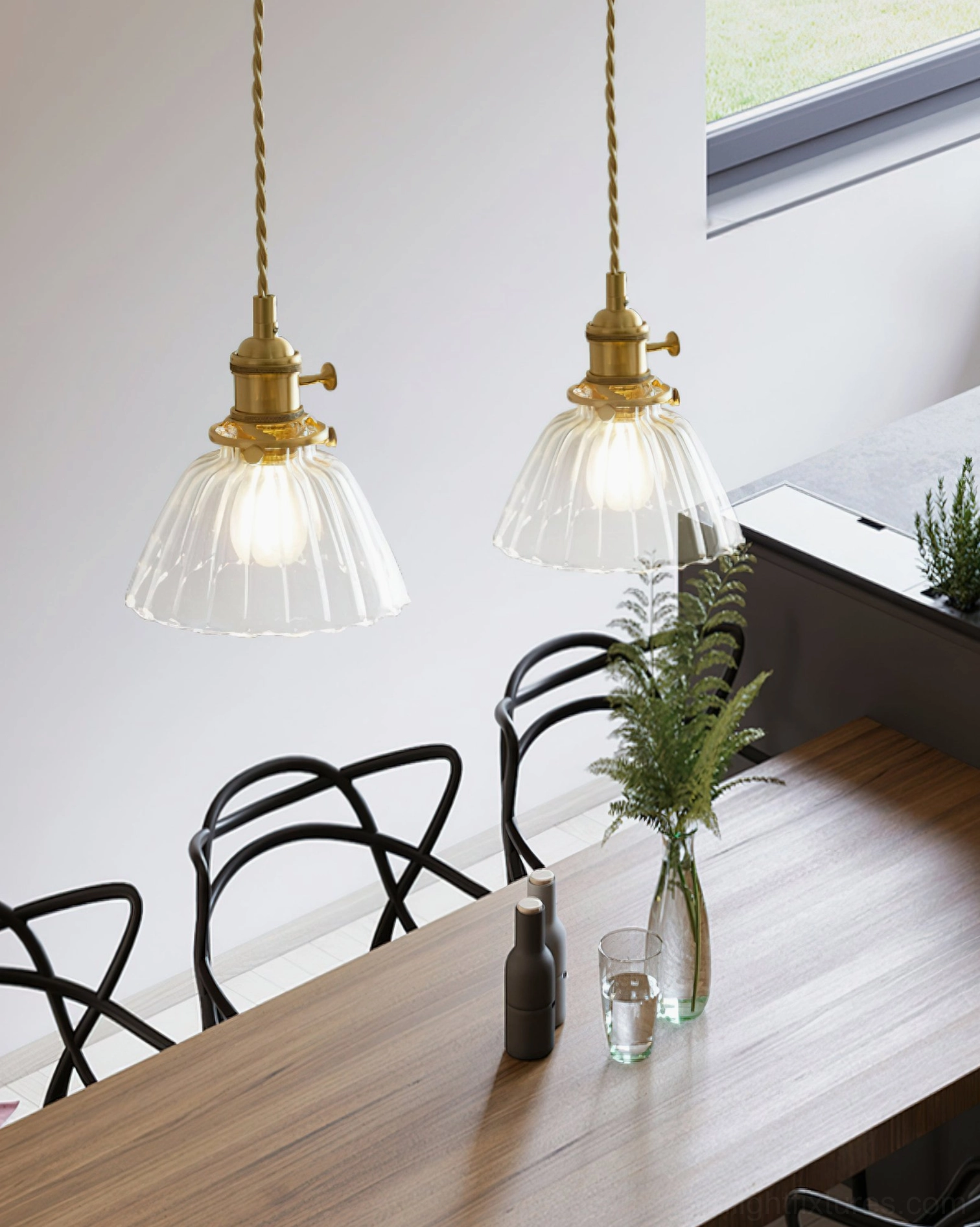 Two Jasmine fluted glass pendant lights with ribbed dome shades in residential dining room setting