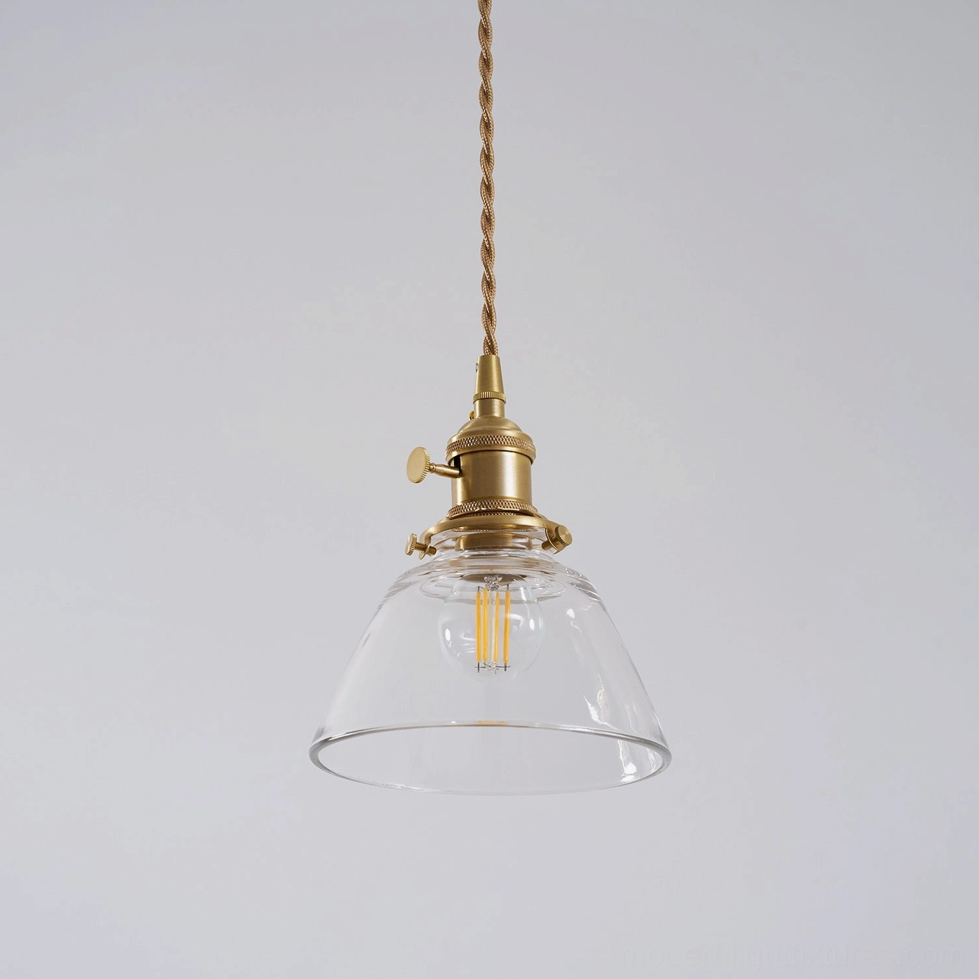 Jasmine globe pendant light creating omnidirectional diffusion in residential bedroom setting