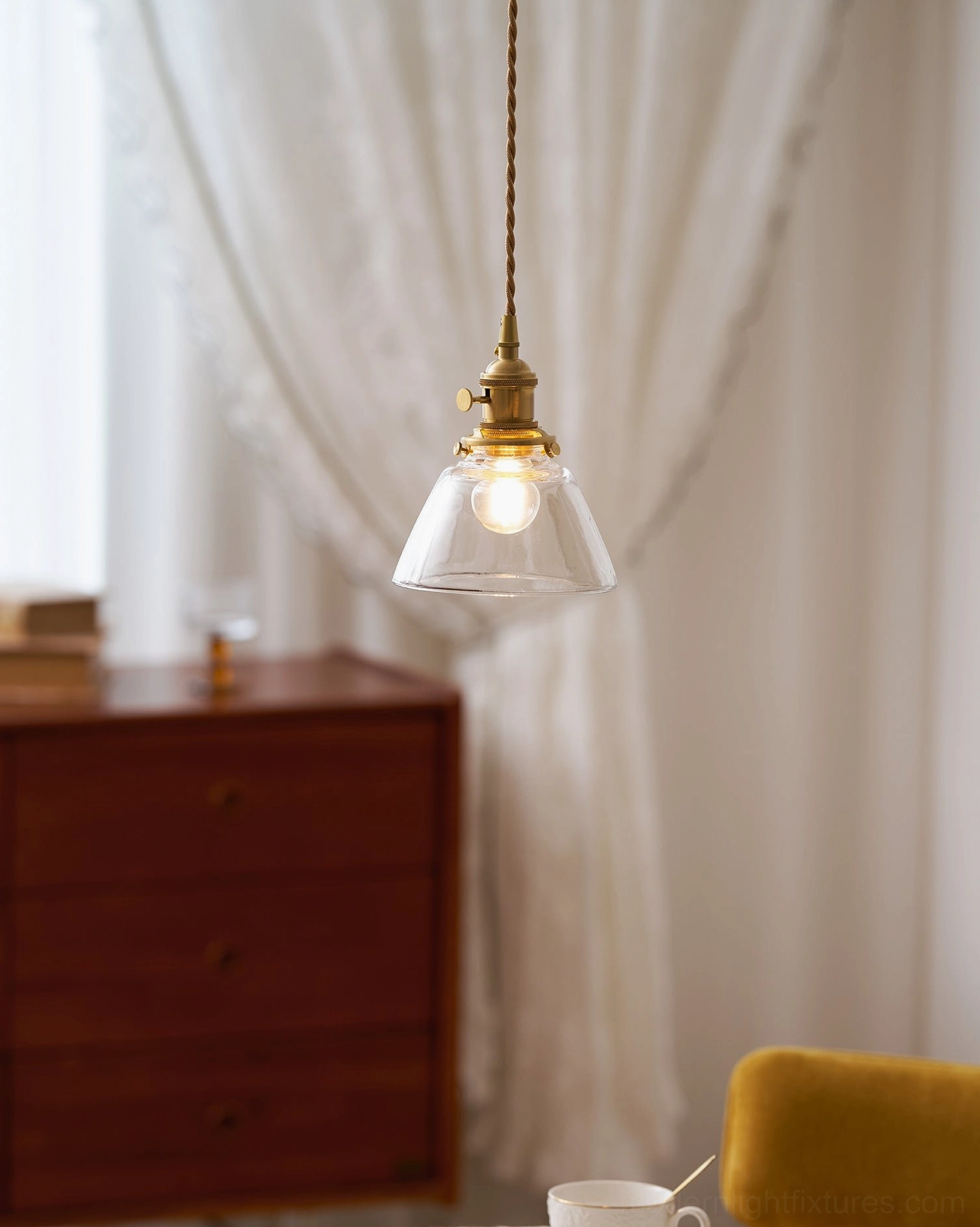 Jasmine globe pendant lights creating symmetrical arrangement in modern dining room with warm ambiance