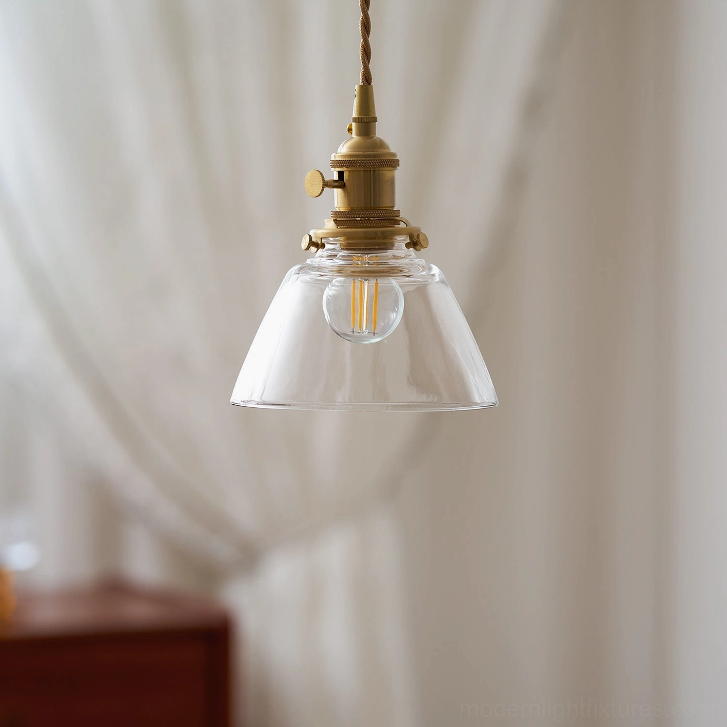 Jasmine pendant light fixtures installed in contemporary kitchen island creating focused task lighting