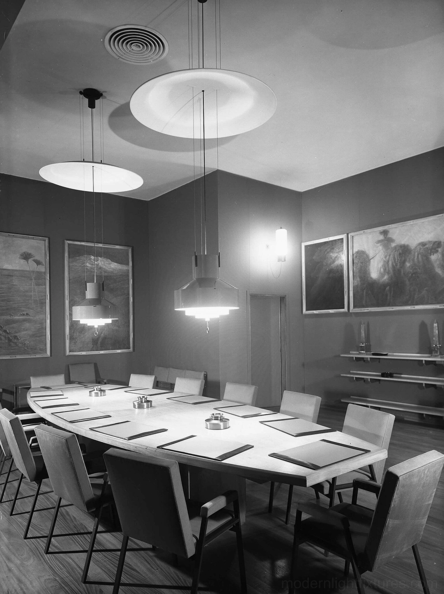 Red jeka adjustable pendant light creating warm 3000K ambiance in dining space