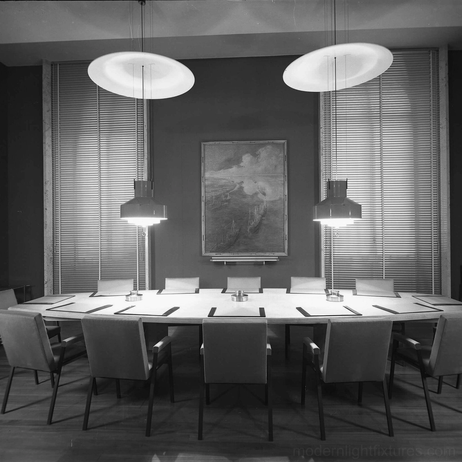 White modern adjustable pendant lamps in contemporary office meeting room