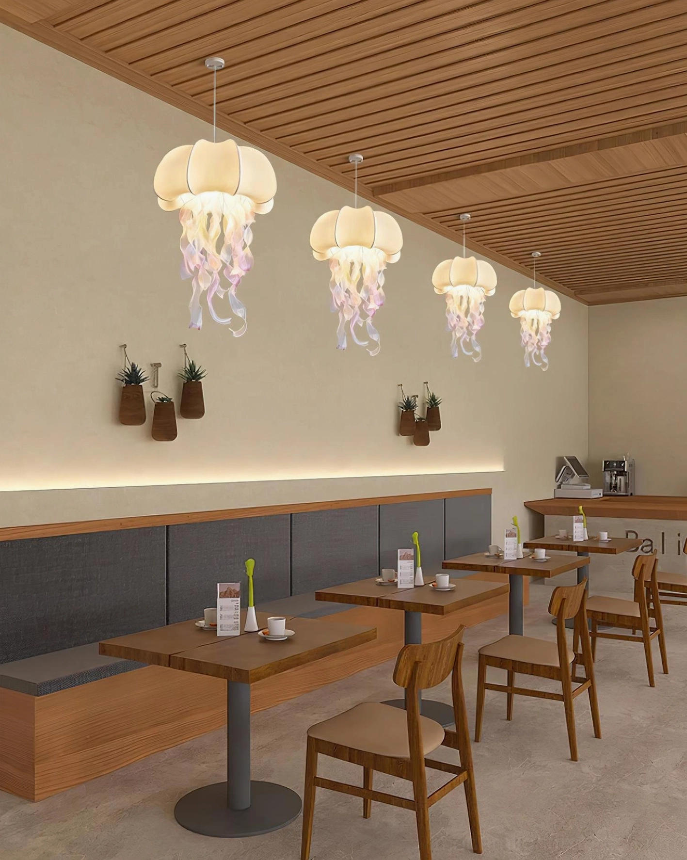 Multiple jellyfish pendant lamps creating ambient lighting in contemporary coffee shop dining area