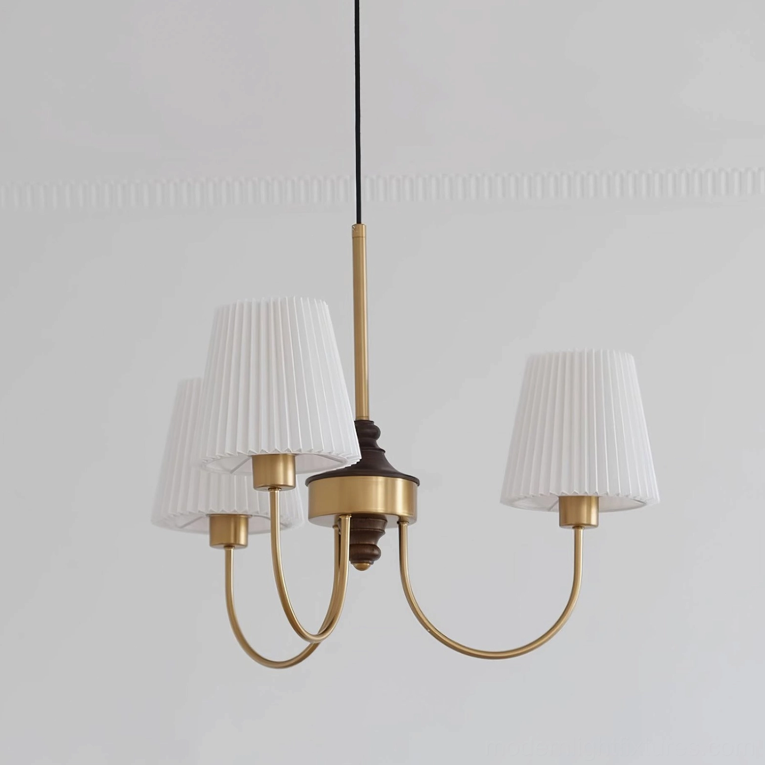 Jeremiah 5-head pendant fixture featuring curved brass arms and quality fabric shading