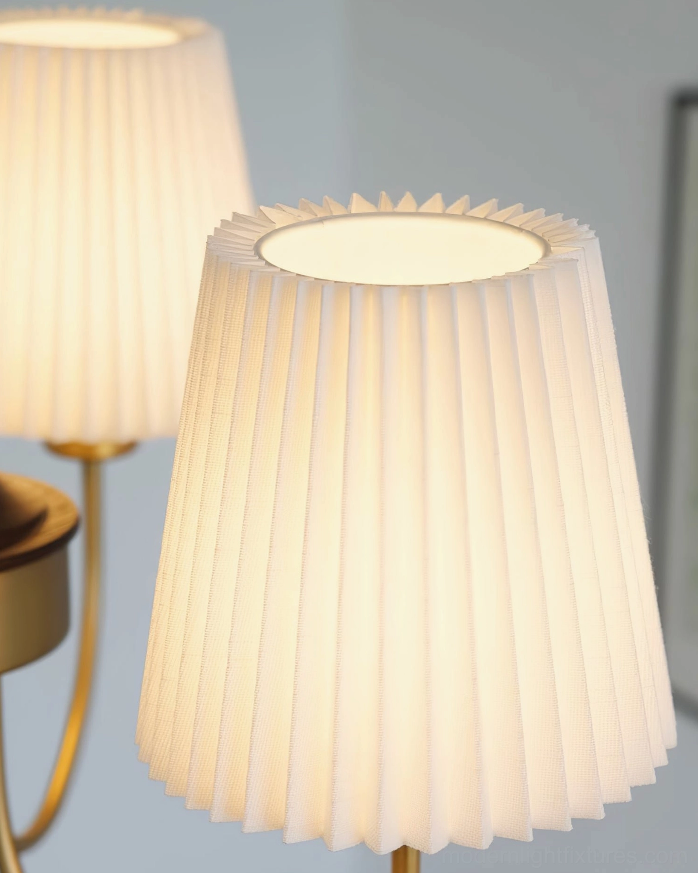 Jeremiah chandelier in foyer creating elegant first impression with sculptural lighting