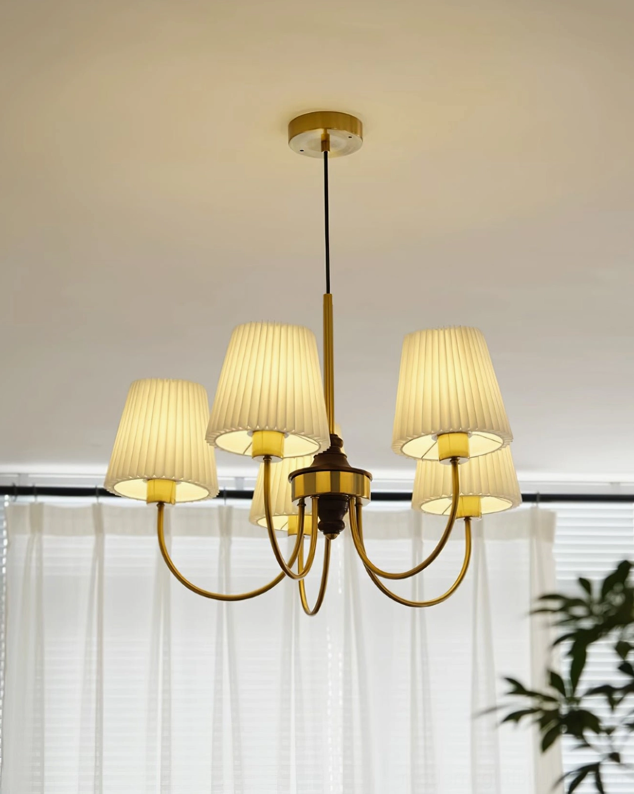 Jeremiah chandelier close-up detail of fabric shade texture and pleated craftsmanship