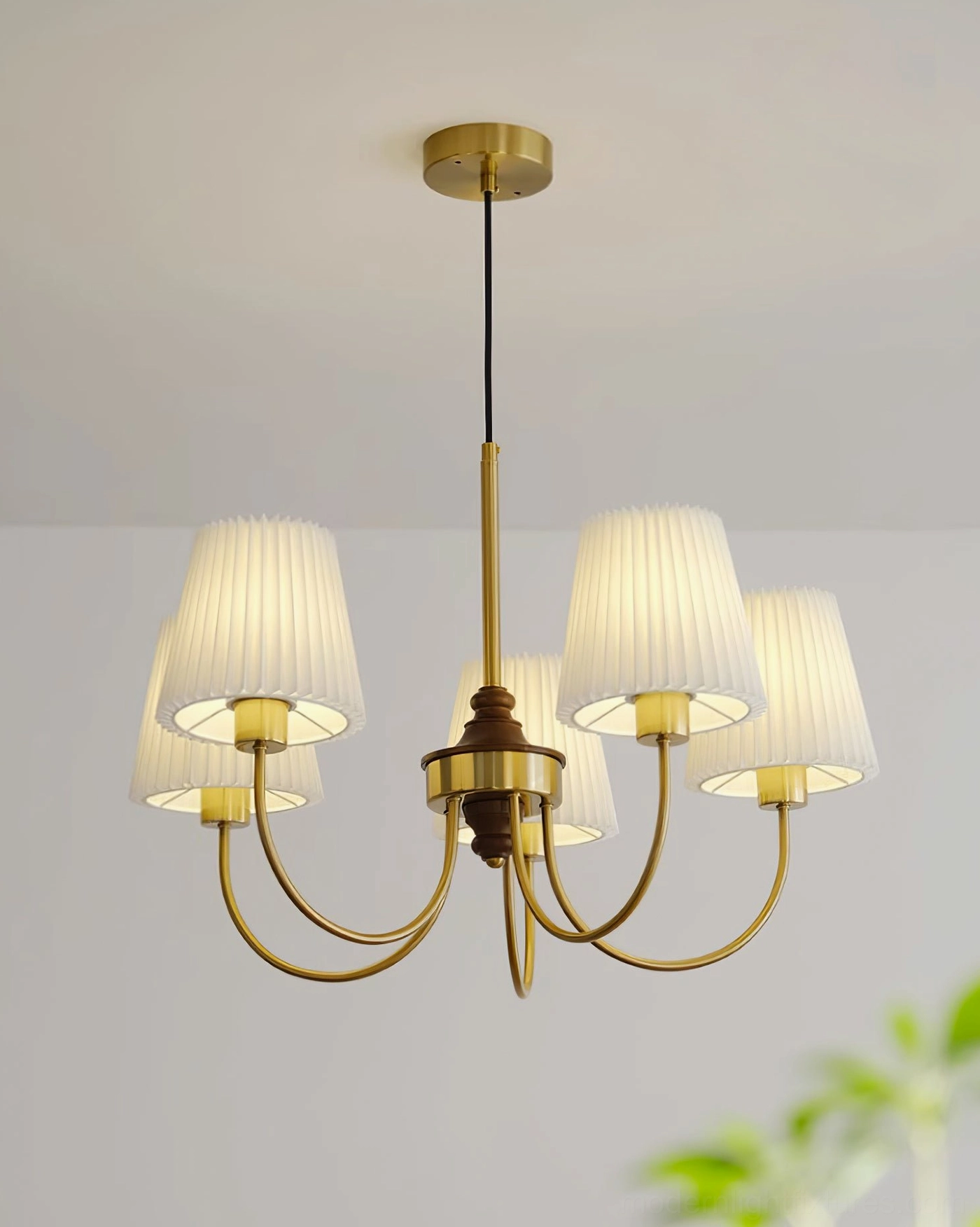 Jeremiah modern chandelier featuring elegant curved metal framework with pleated fabric lamp shades