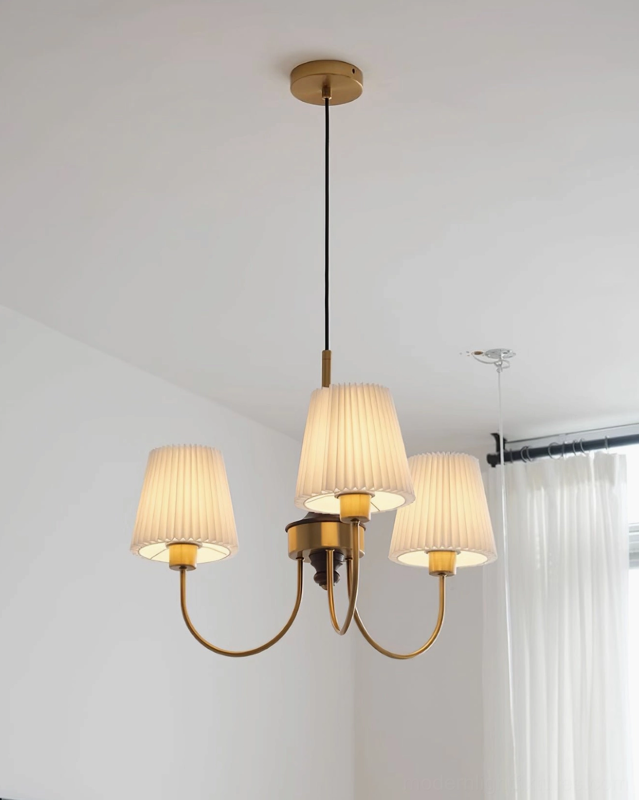 Jeremiah pendant light hanging fixture demonstrating adjustable height cable installation