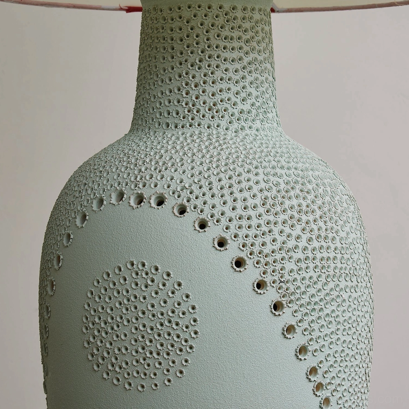 Jordyn ceramic table lamp featuring organic dot embossing pattern and soft natural color glaze on ceramic base