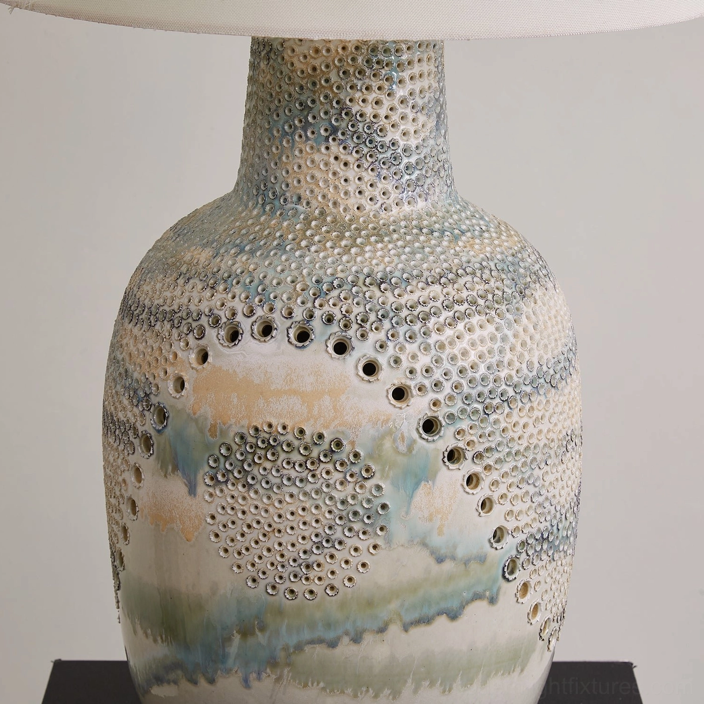 Jordyn ceramic table lamp with hand-embellished dot constellation pattern and fabric drum shade detail