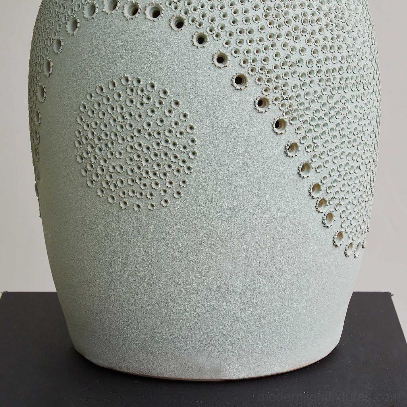 Jordyn table lamp showcasing handcrafted ceramic base with raised dot texture and natural glaze variations