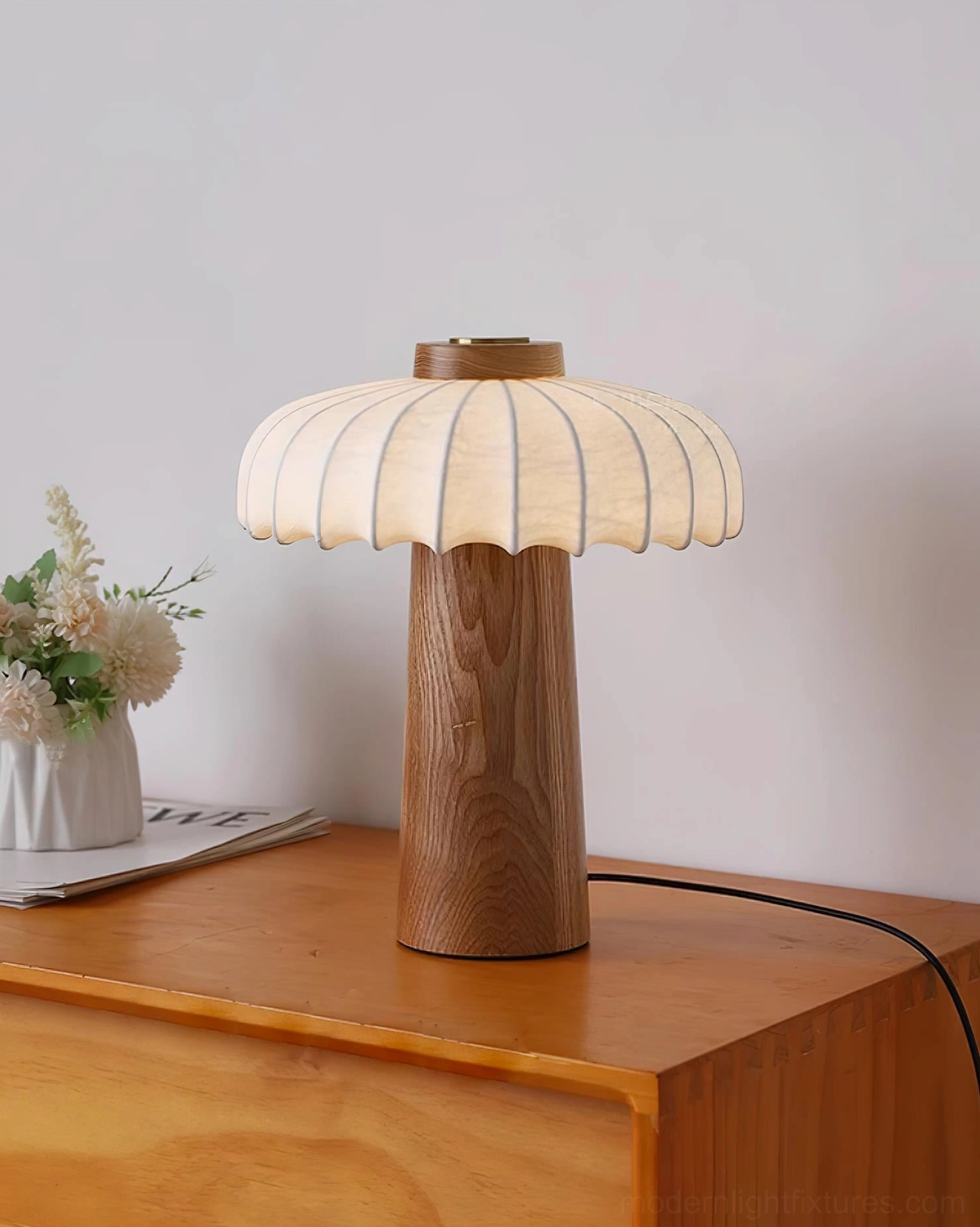 Juego table lamp with integrated LED showing 50000 hour lifespan specification