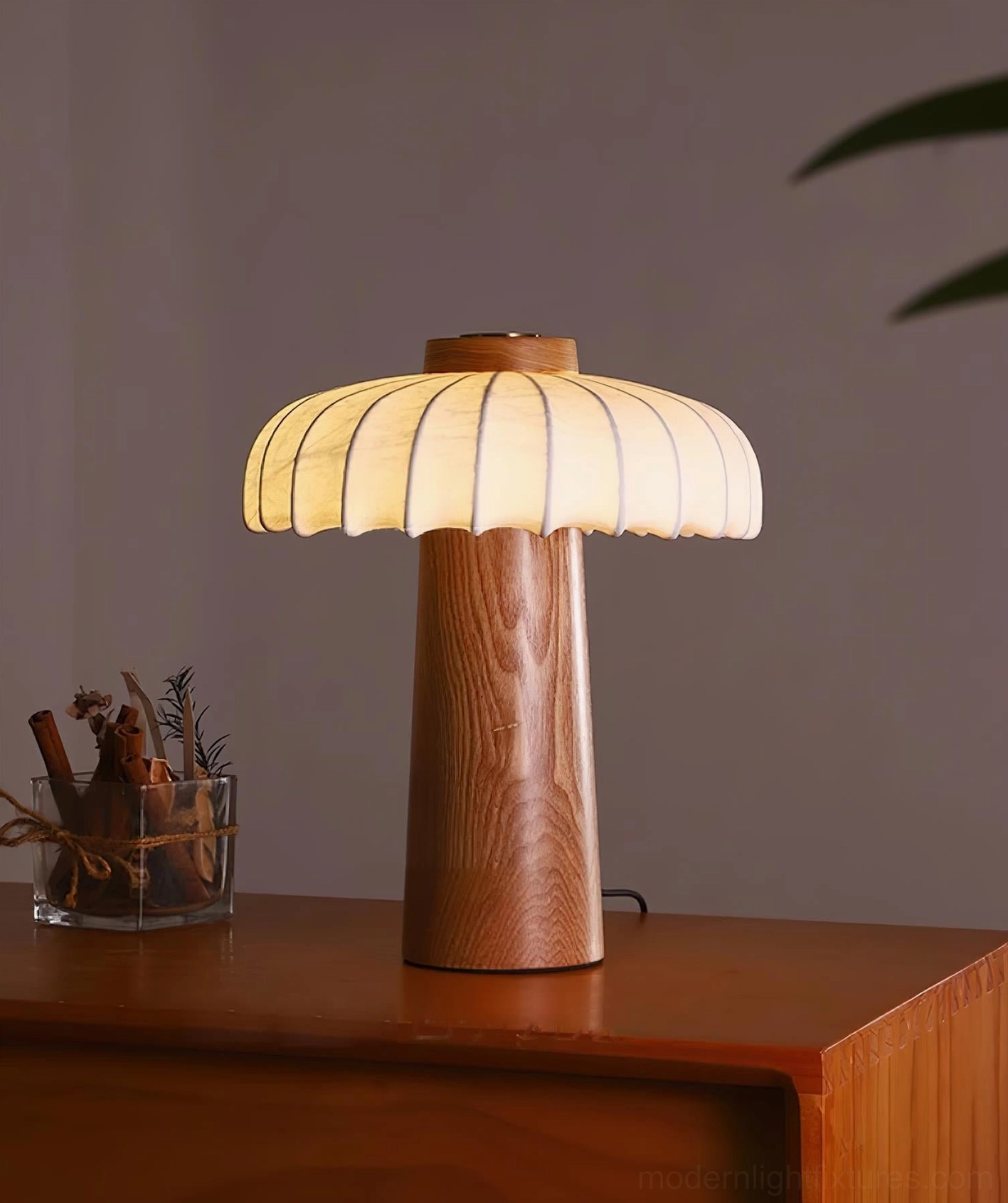 Juego wooden table lamp showing mid-century modern design with fabric shade and wood base