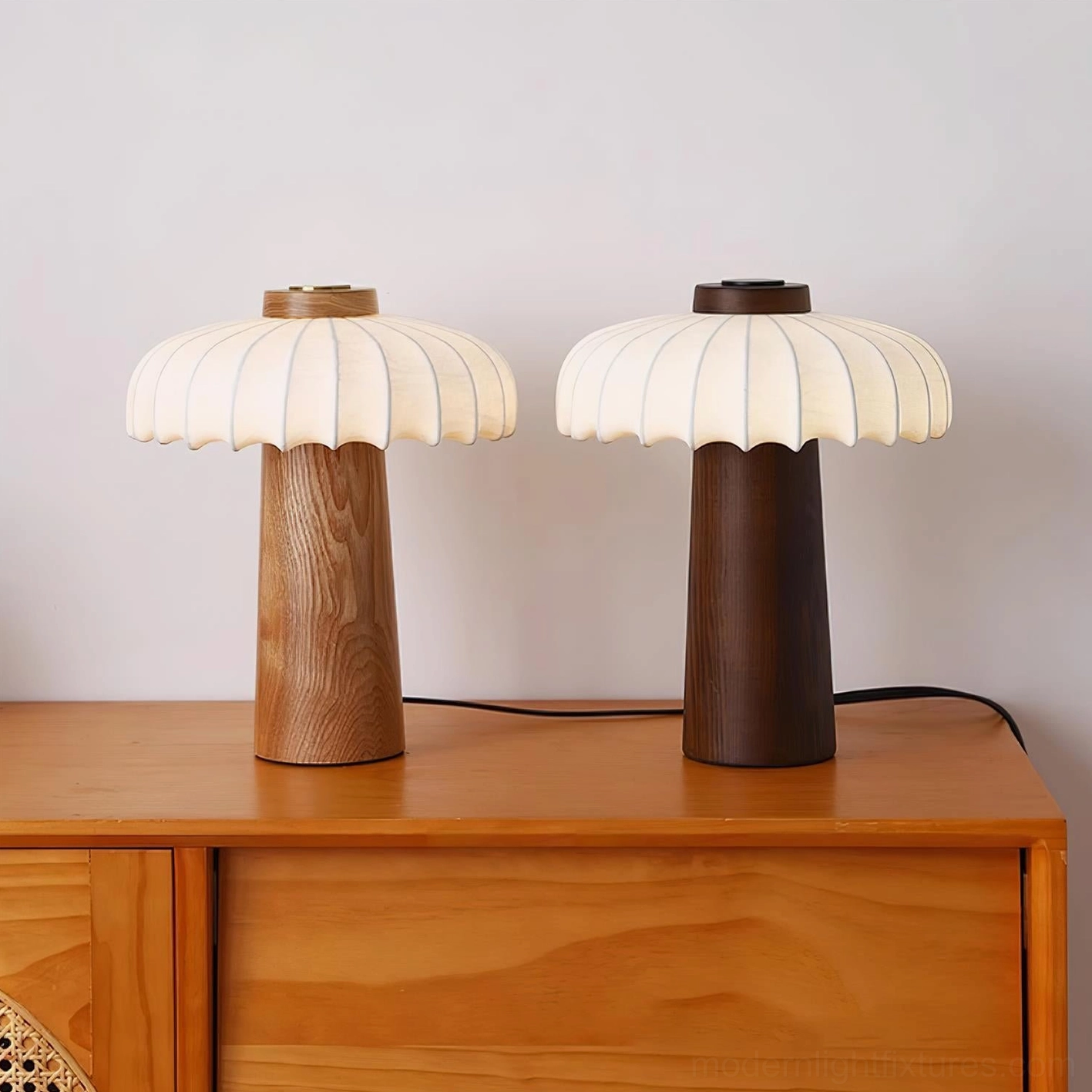 Juego mushroom table lamp creating ambient lighting in Scandinavian interior design