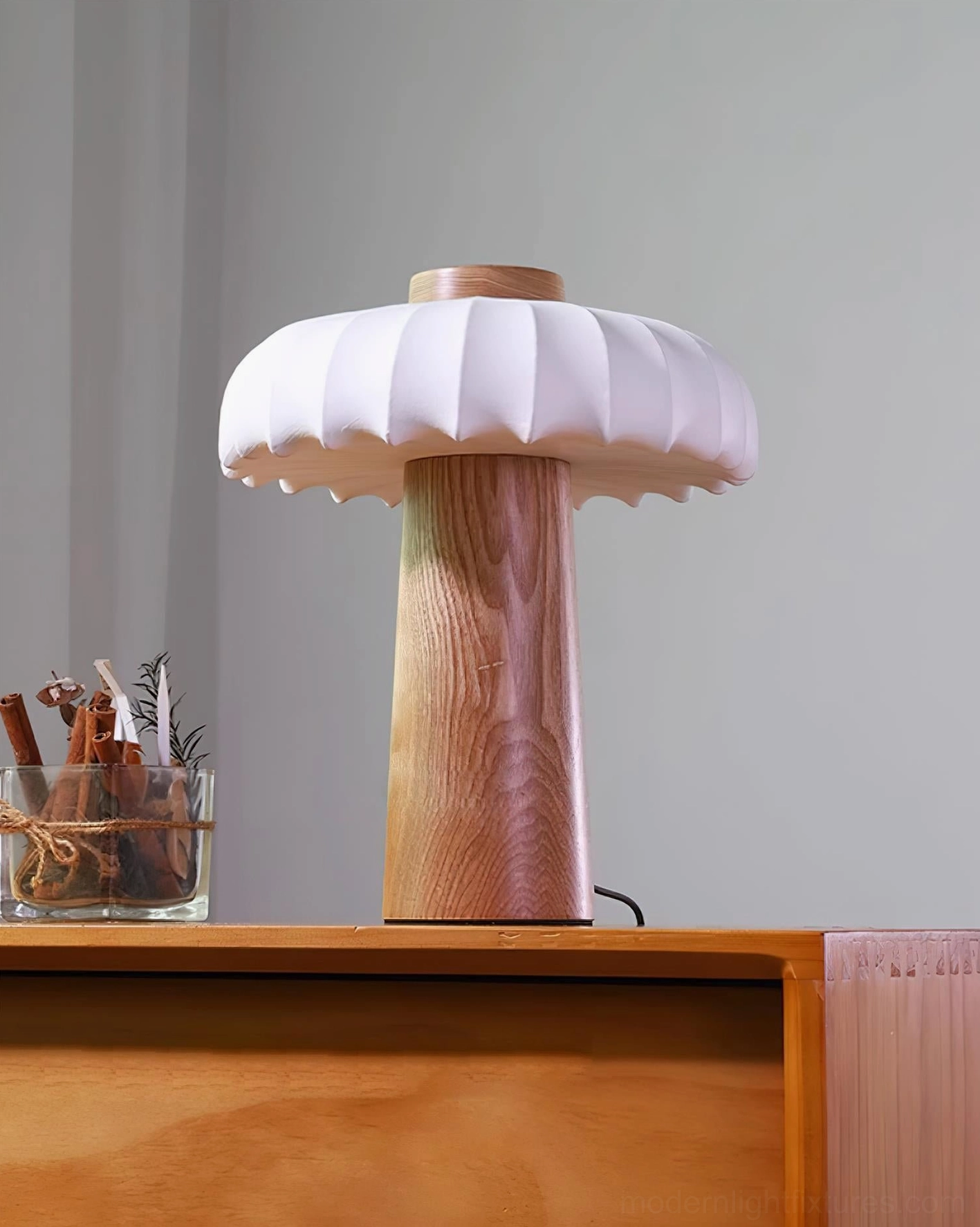 Juego table lamp showing Scandinavian minimalist design in living room display