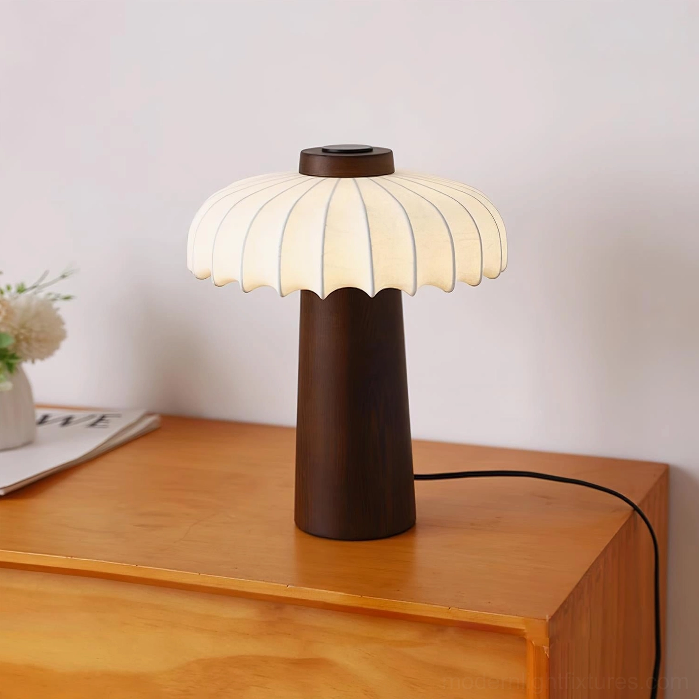 Juego table lamp demonstrating Japanese wabi-sabi aesthetic with organic mushroom form