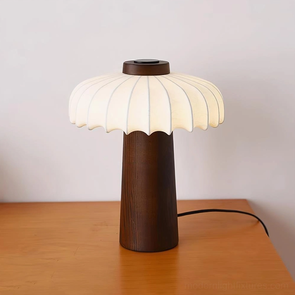 Juego mushroom table lamp with walnut color wood base and silk pleated shade