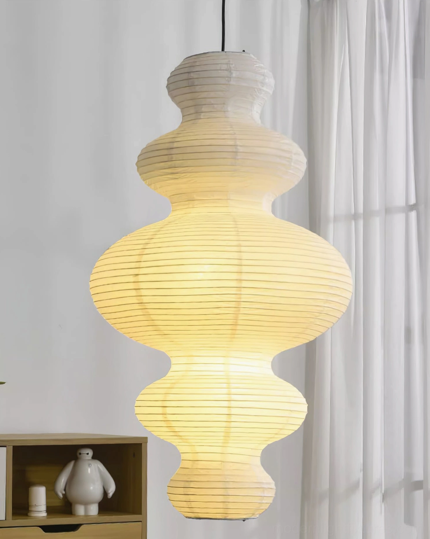 Juni plug-in pendant light in contemporary bedroom - soft ambient paper shade