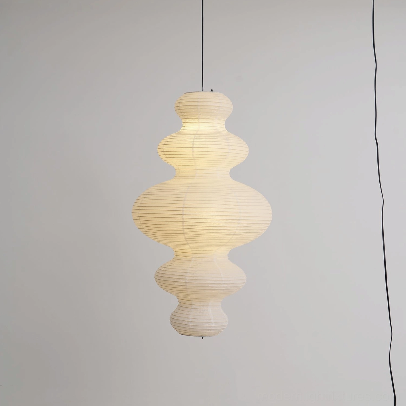 Juni plug-in pendant lamp detail - ceiling mount and wire suspension system