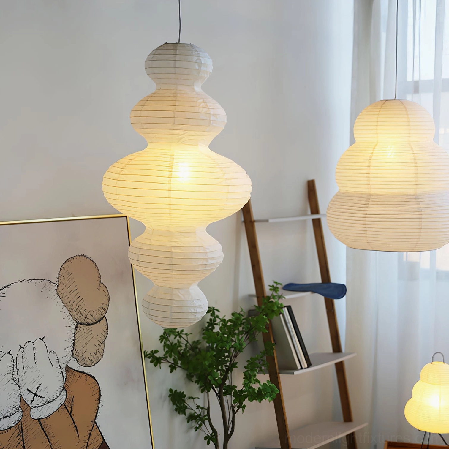 Juni plug-in pendant light in reading nook space - comfortable warm illumination
