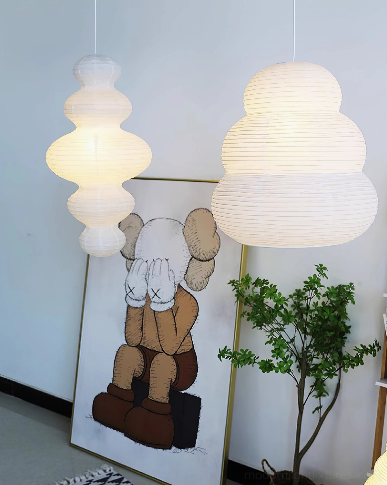 Juni pendant light hanging in residential interior - warm atmospheric paper glow