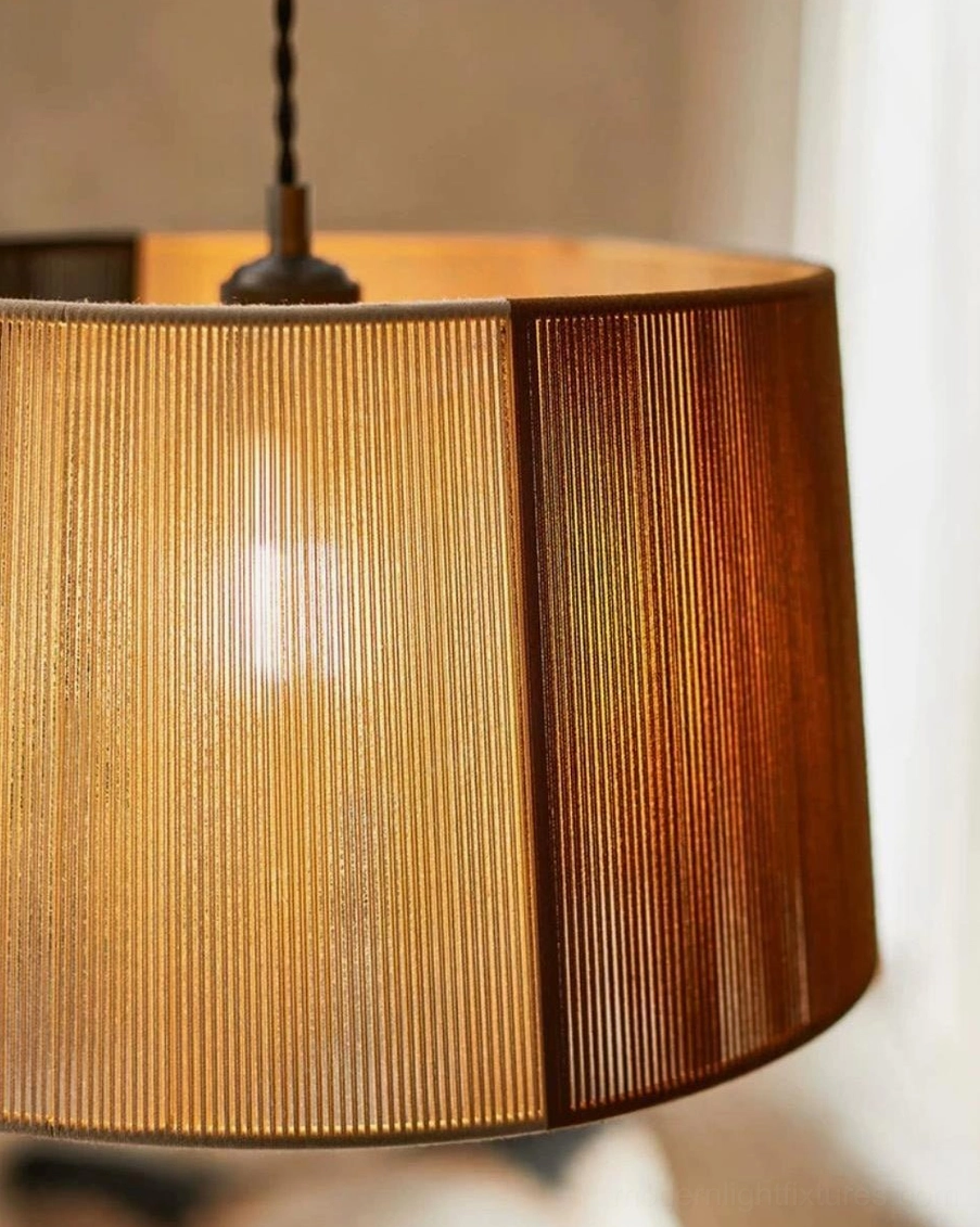Close-up detail shot of tri-tone jute rope woven shade texture, grey and brown striped pattern, handwoven natural fiber