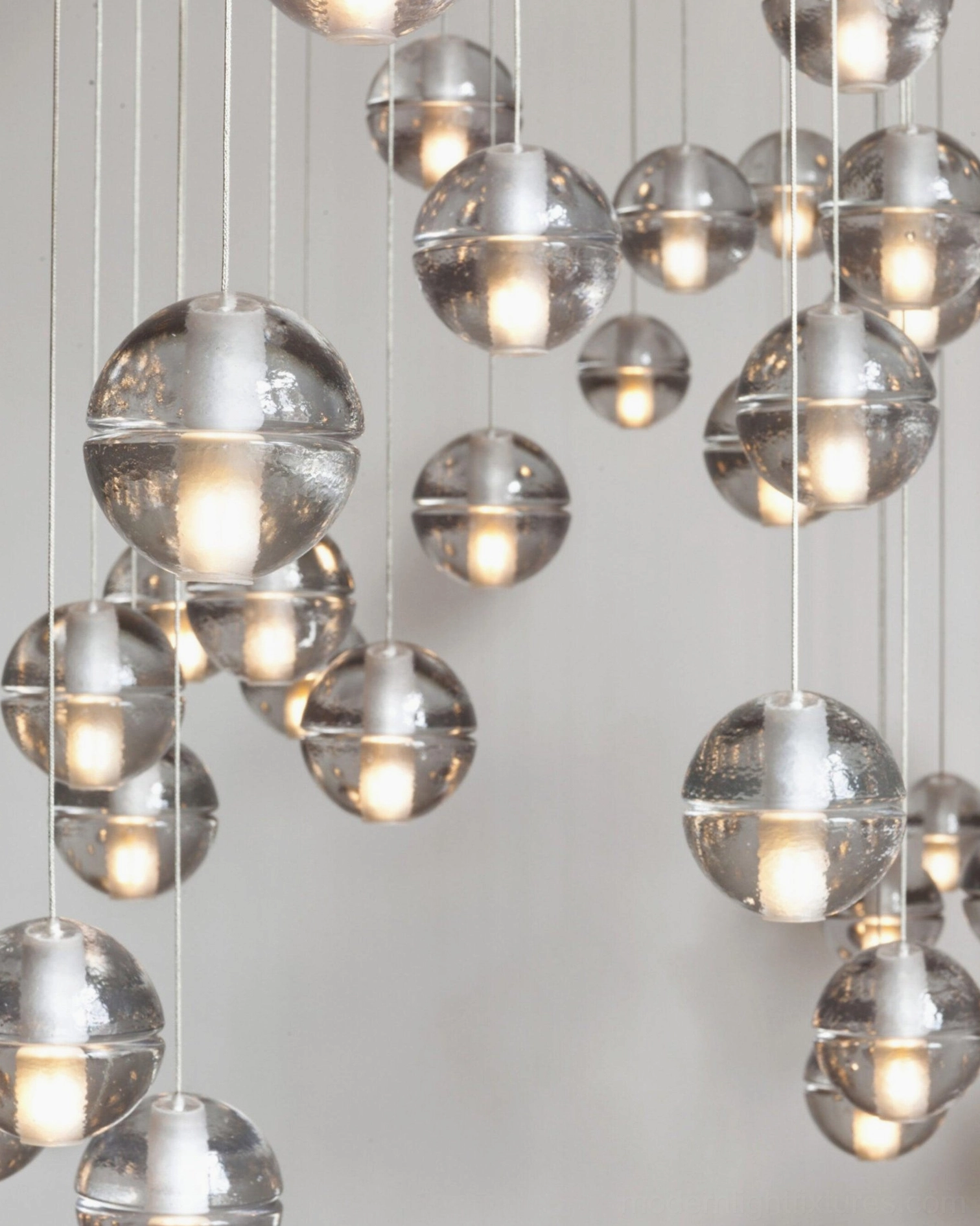 K9 crystal cluster pendant light with gradient glass orbs showcasing light refraction