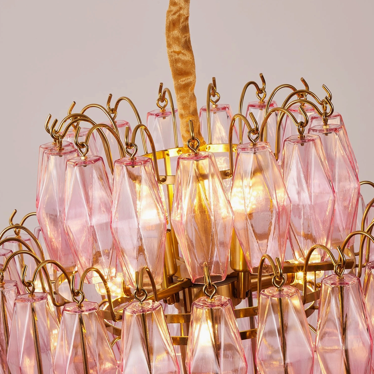 Contemporary tiered glass chandelier architectural fixture, layered prism design and metal frame assembly