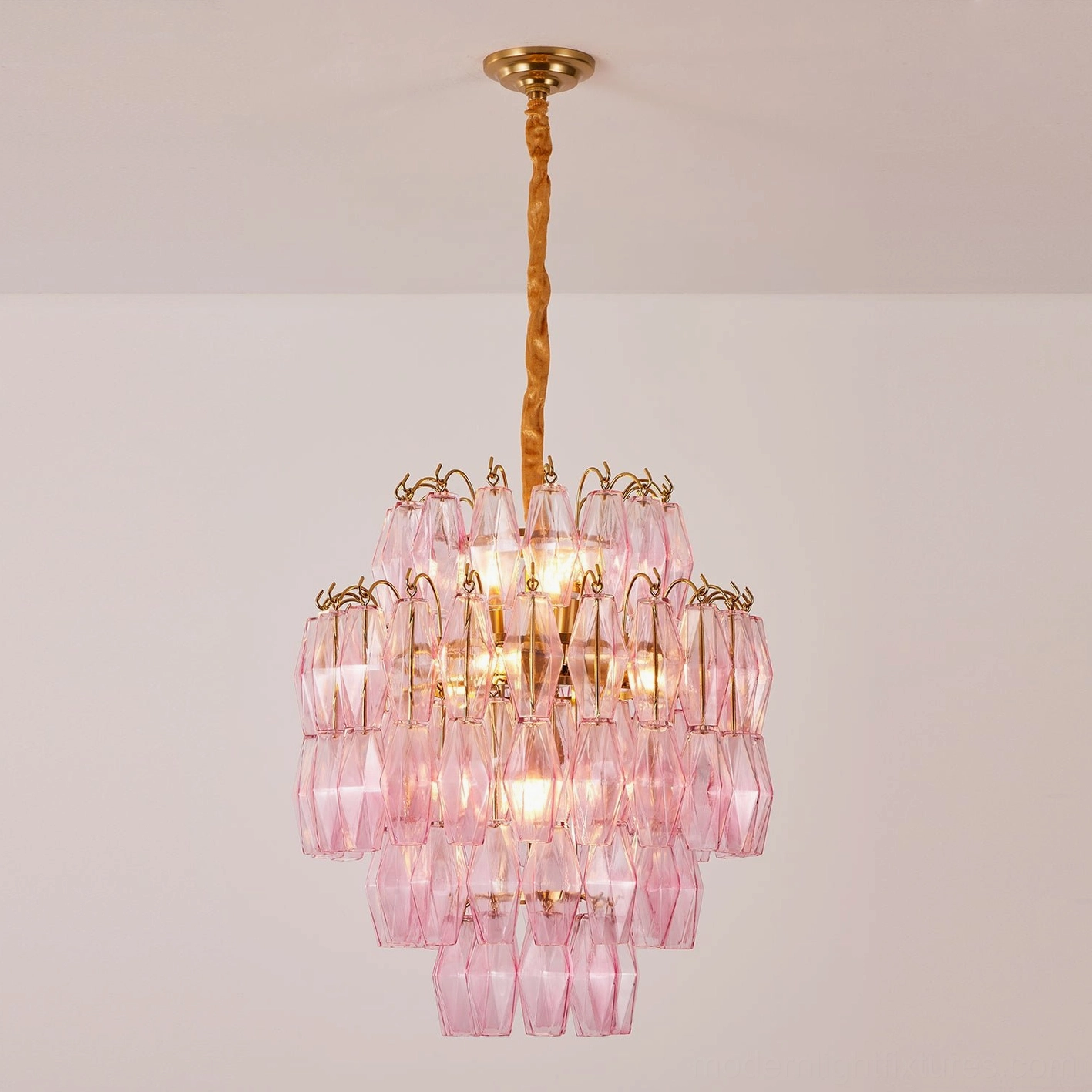 Contemporary tiered chandelier with precision-cut glass prisms, architectural lighting fixture detail view