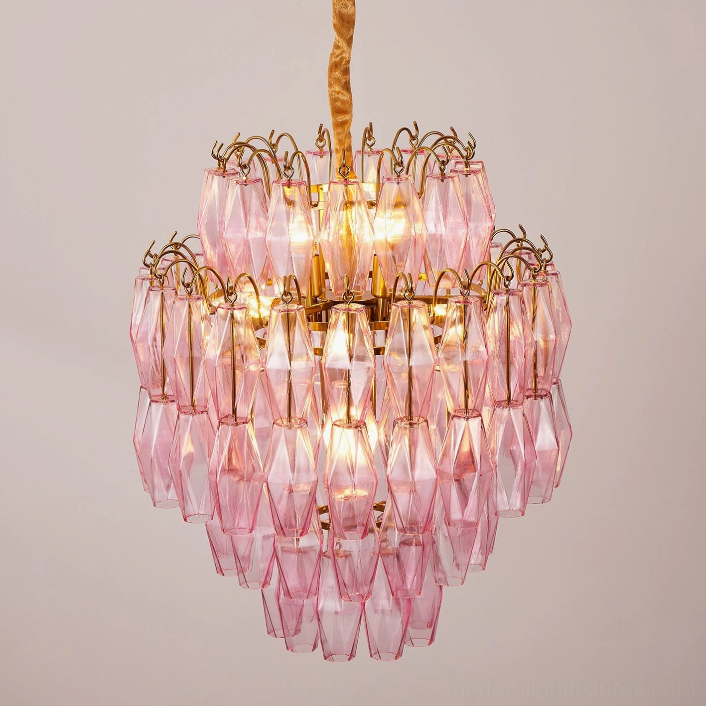 Modern tiered chandelier with faceted glass prisms and adjustable chain, complete design view