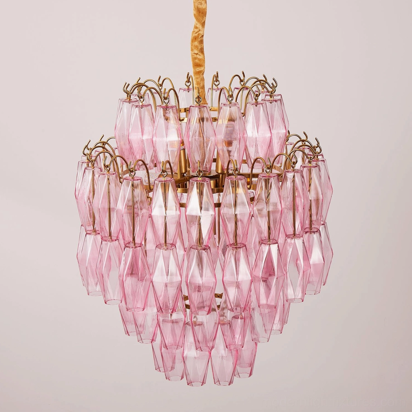 Kaelis geometric tiered glass chandelier, full fixture view showing prism layers and metal hardware