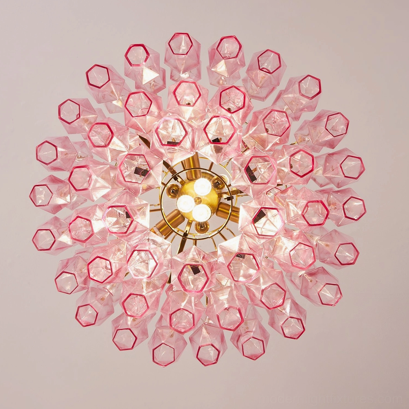 Tiered chandelier with layered glass prisms, suspension view of complete modern fixture assembly