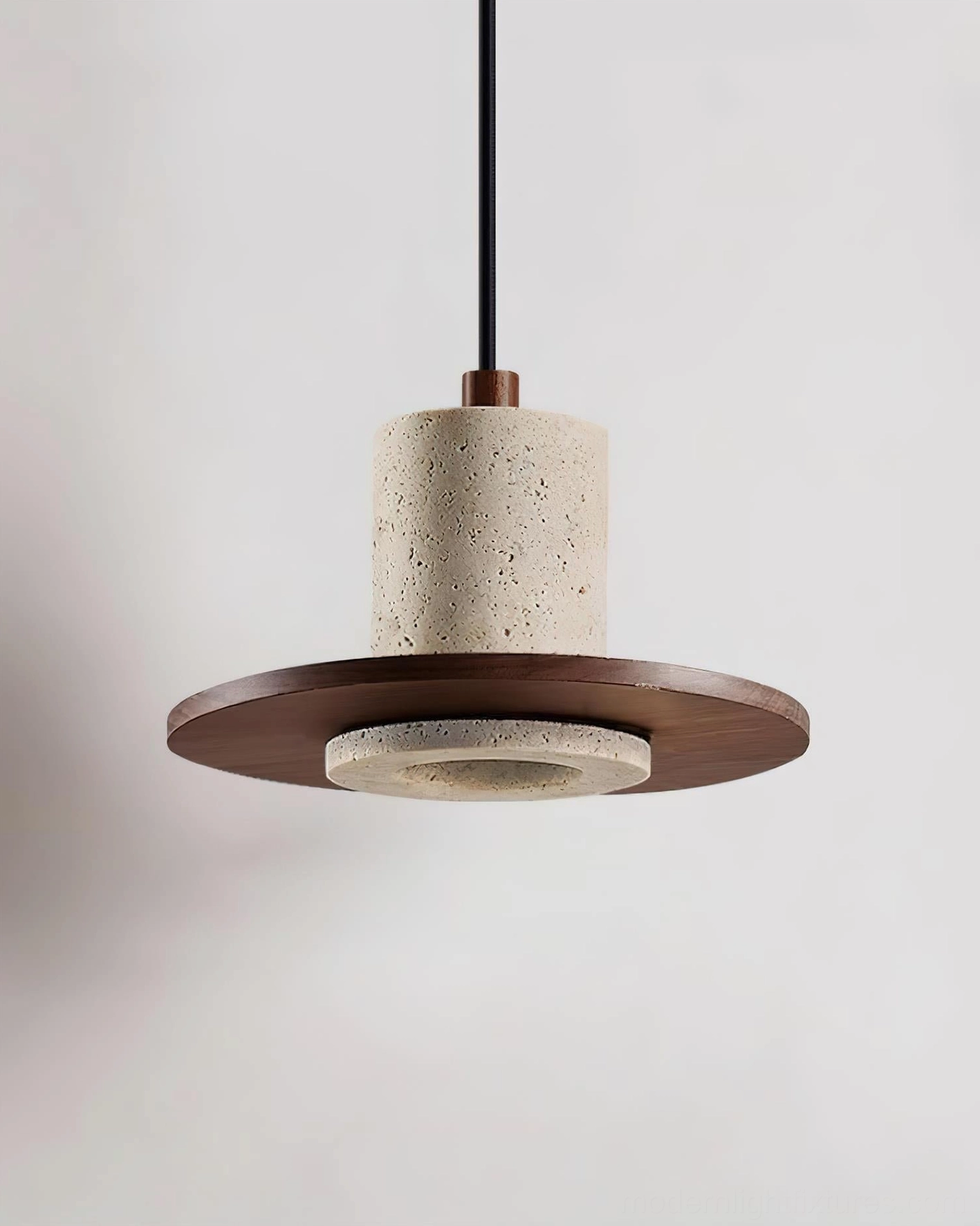 Three-quarter side view of Kalea pendant light showing reverse lighting structure and cylindrical body