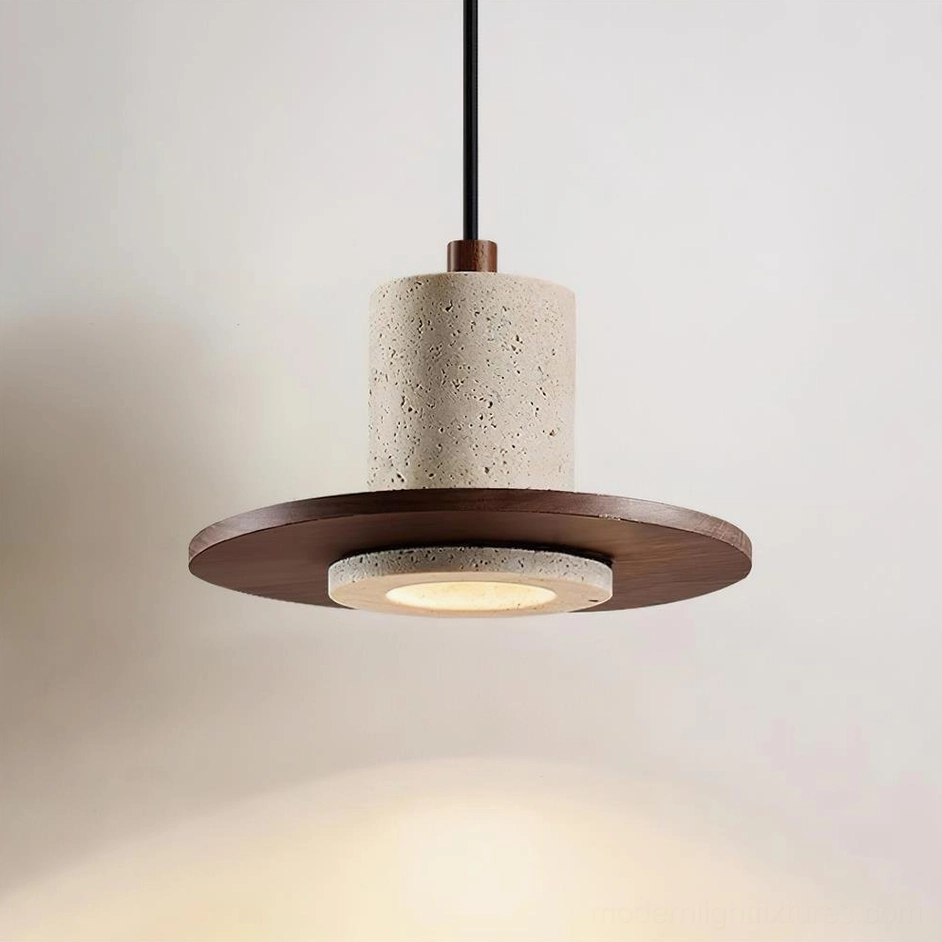 Single head Kalea pendant lamp showing walnut base and travertine stone shade with cast light shadow
