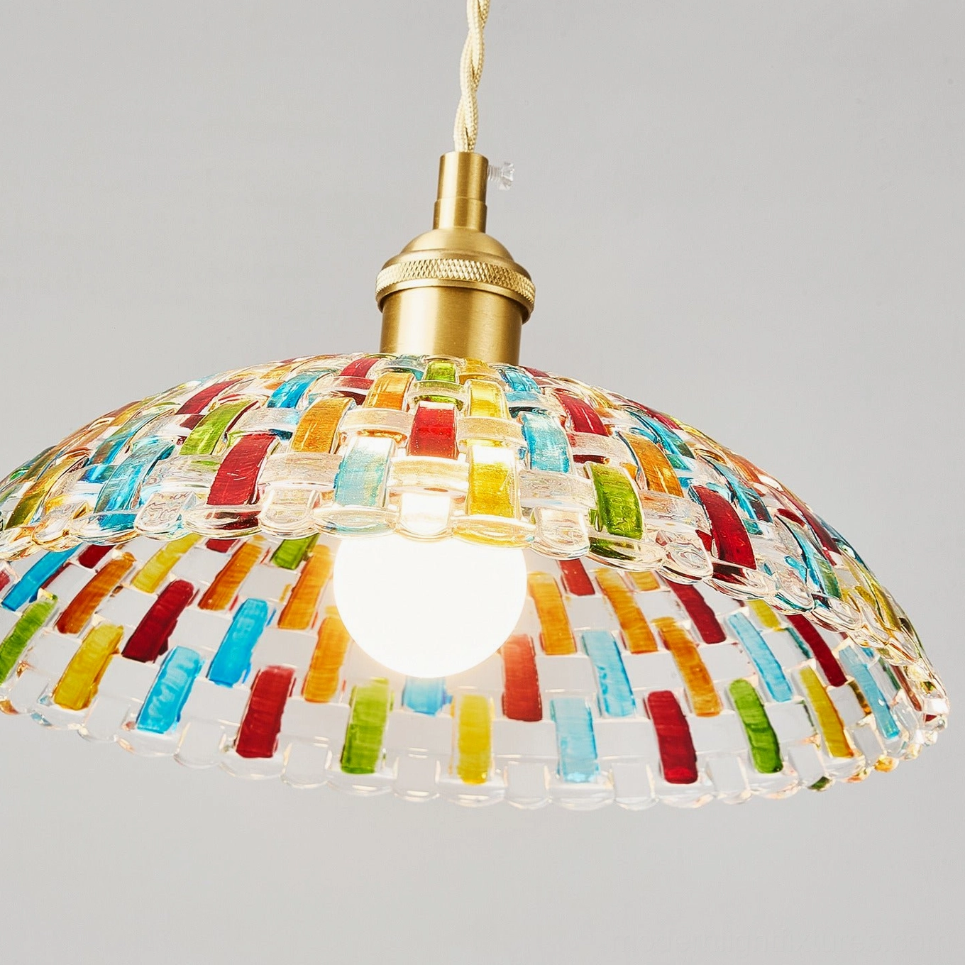 Kaleido hand-crafted mosaic glass pendant light artistic studio photograph with warm ambient glow