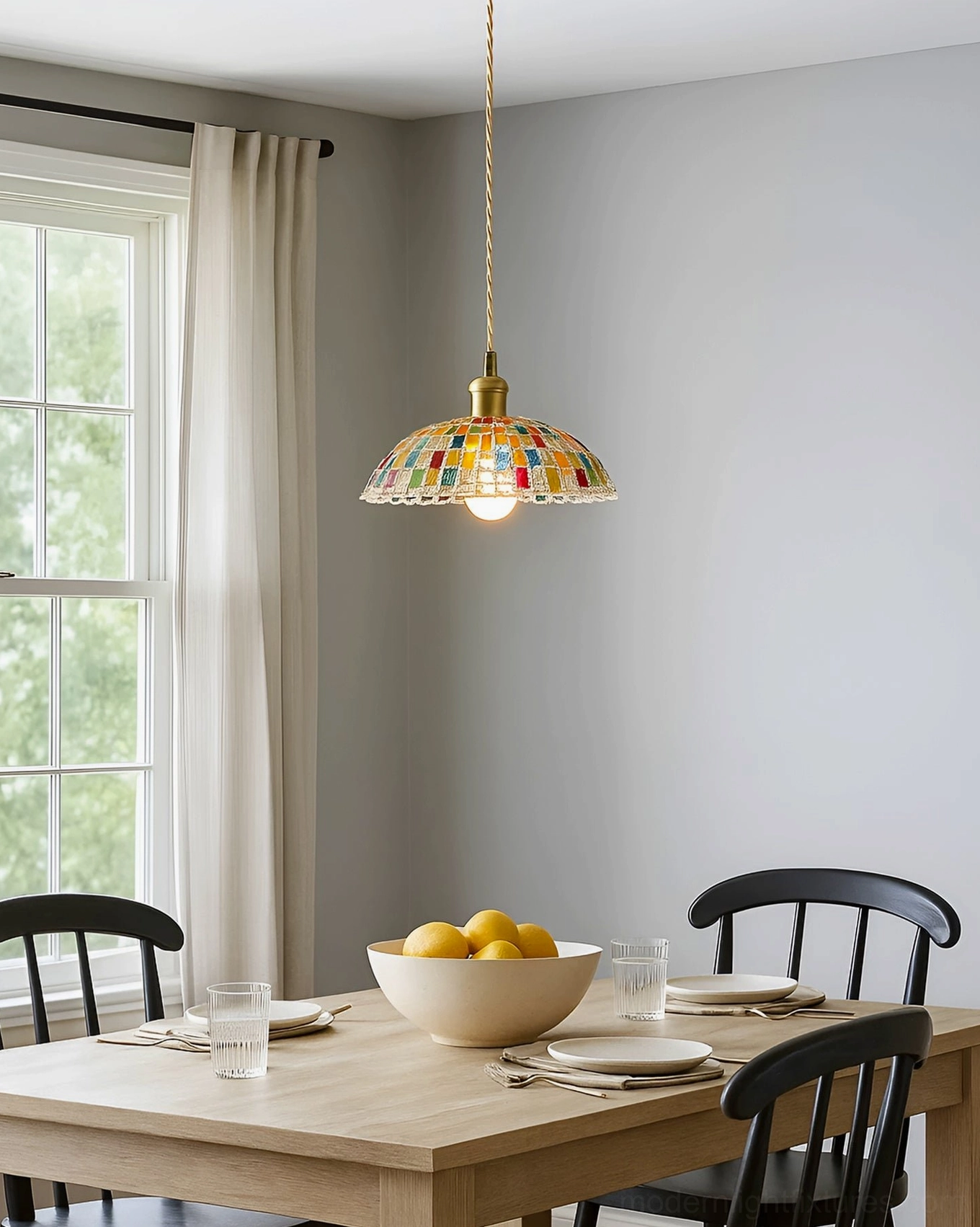 Kaleido hand-crafted stained glass pendant lamp in cozy dining room setting with tableware and fresh fruit bowl